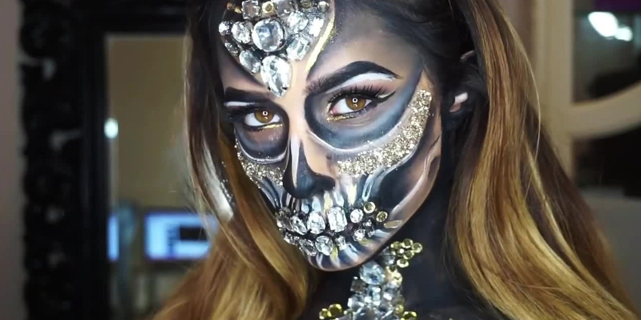 Woman with elegant sugar skull makeup for Day of the Dead