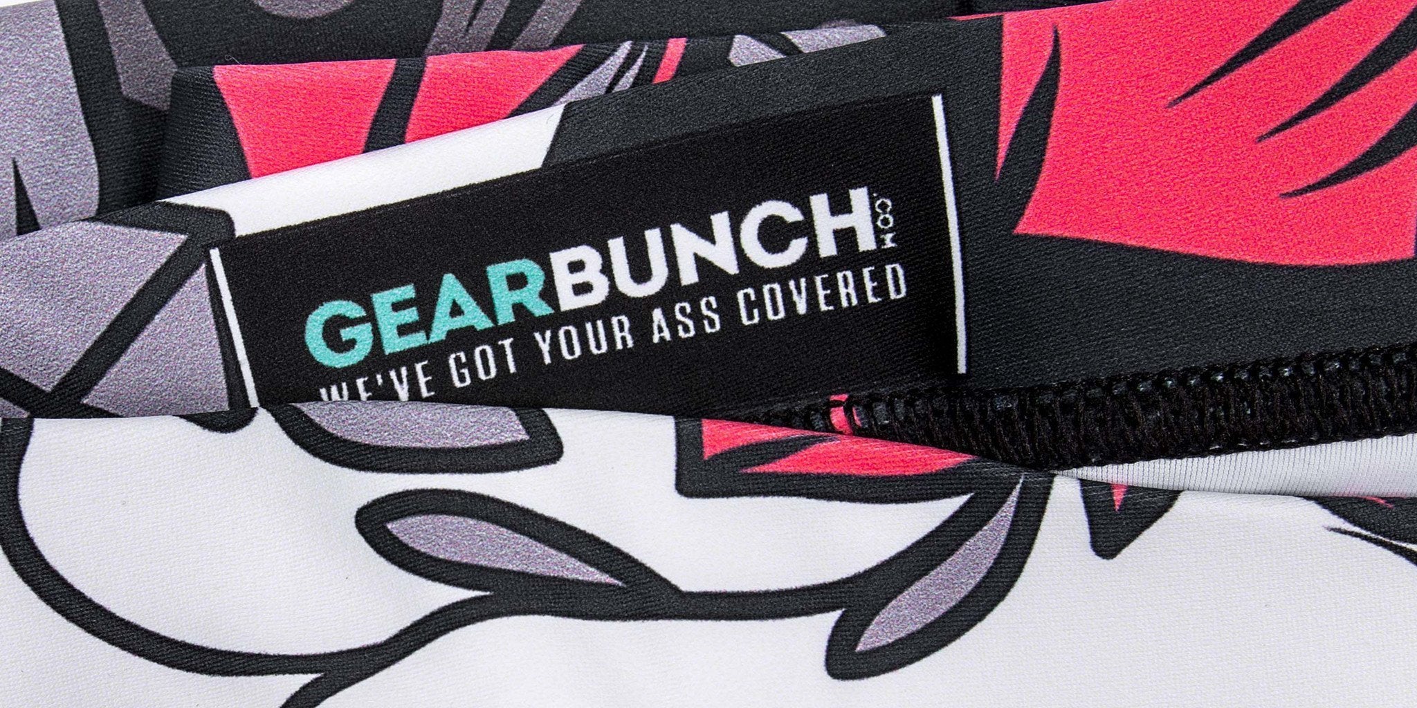 Close-up of GearBunch leggings label featuring the phrase 'We've got your ass covered'