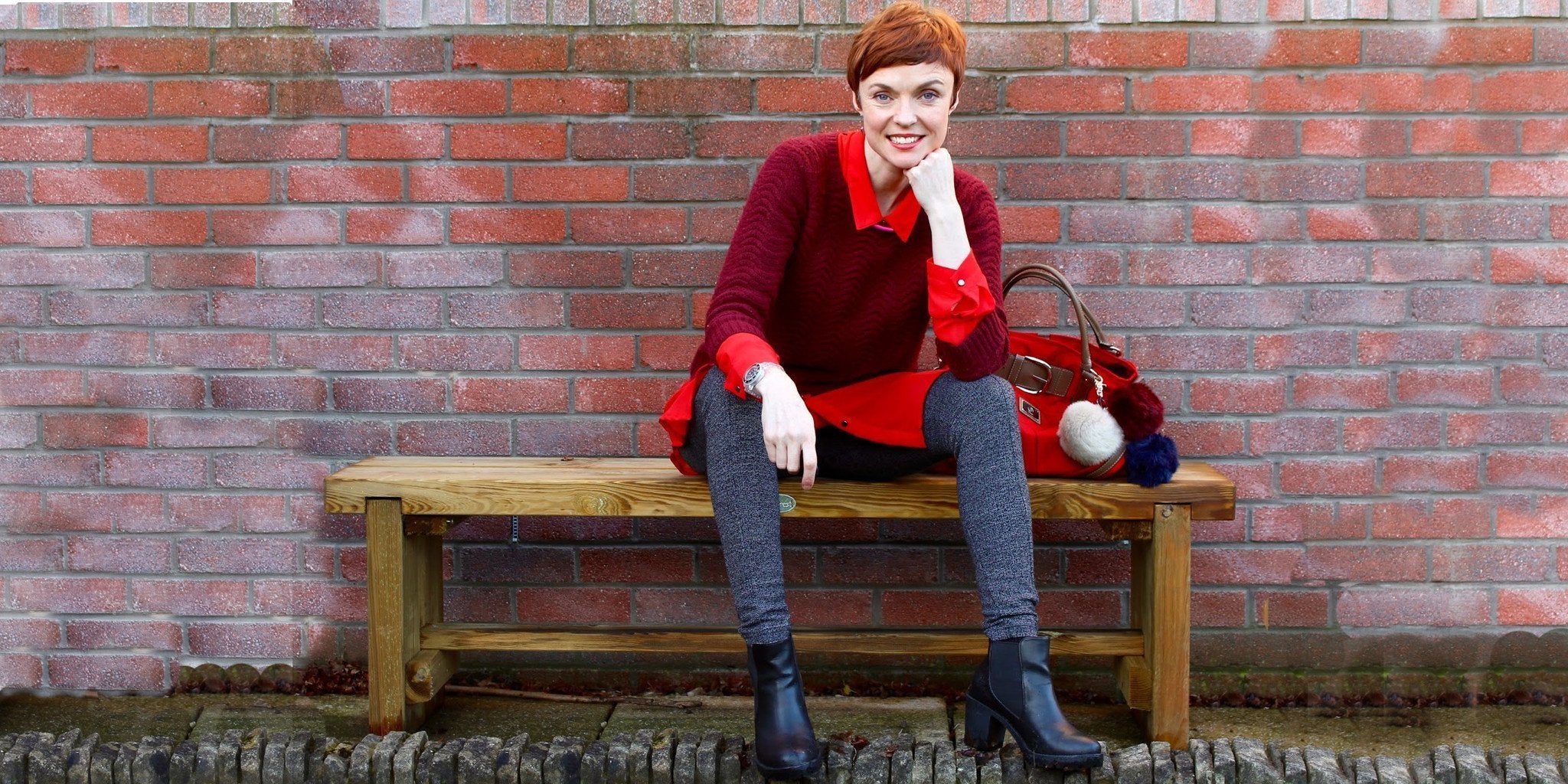 Woman in sweater vest showing a comfortable and stylish leggings outfit