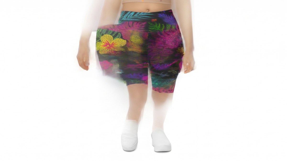 Lifestyle image of a model wearing Rainbow Paillette Tropical Bike Shorts from GearBunch