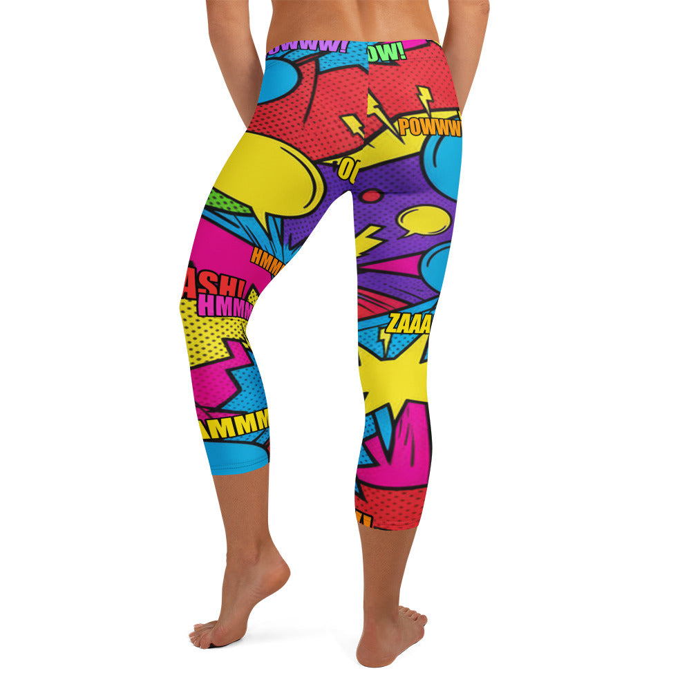 Dynamic comic book print GearBunch Capri Leggings featuring speech bubbles and action words in a retro style.