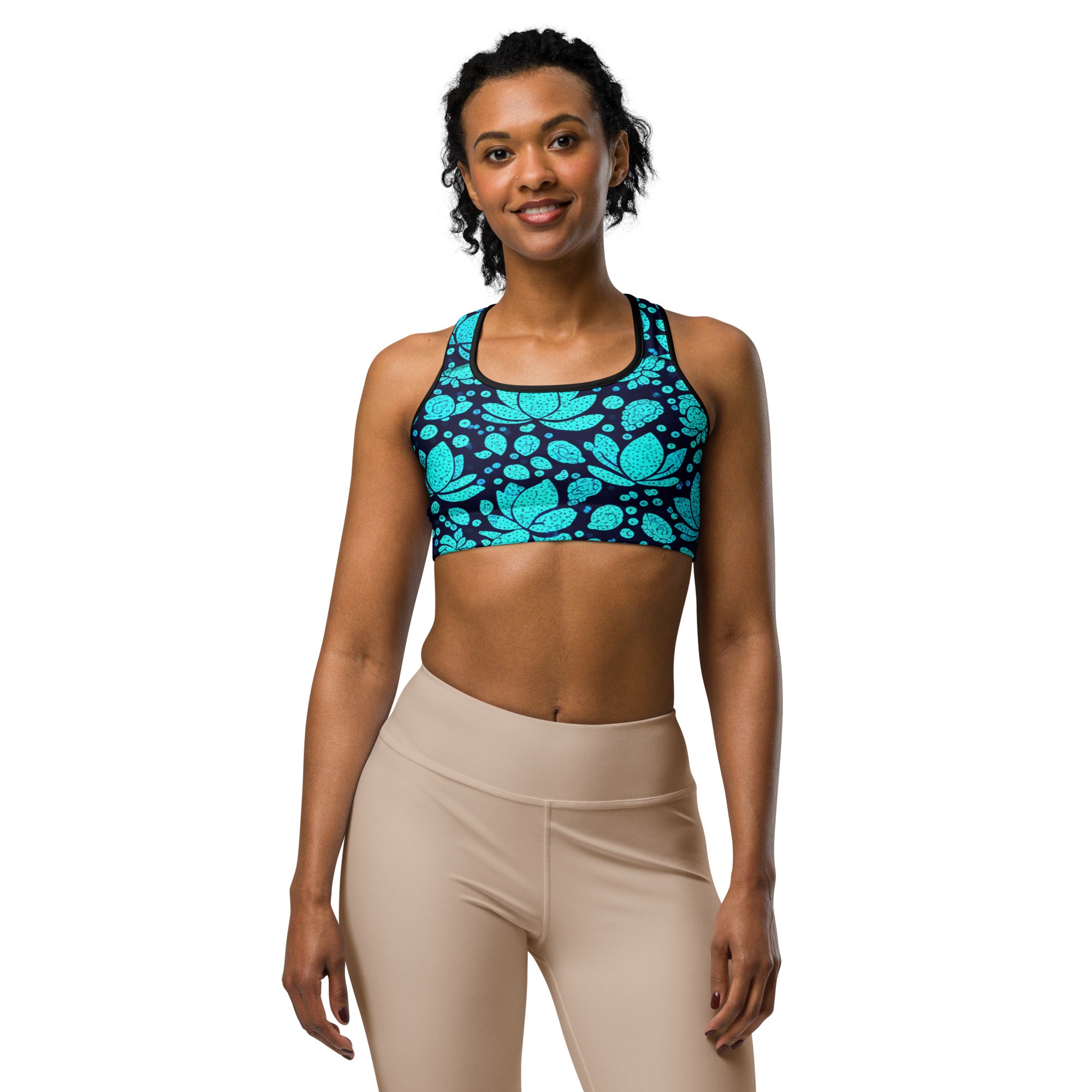 Women's teal lotus flower sports bra front view