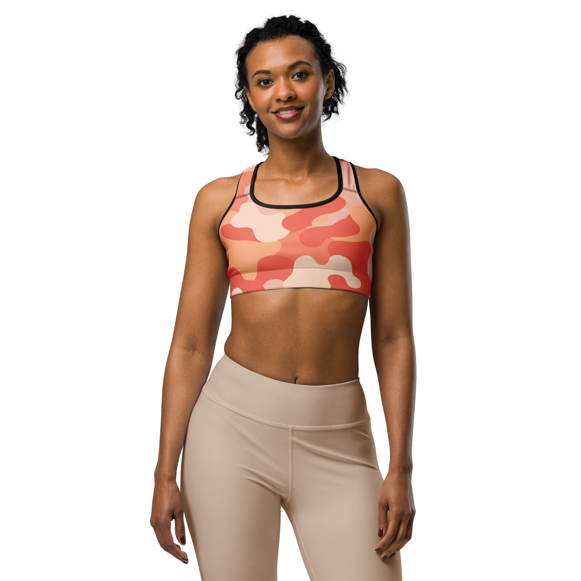 Women's coral sunset camo sports bra front view