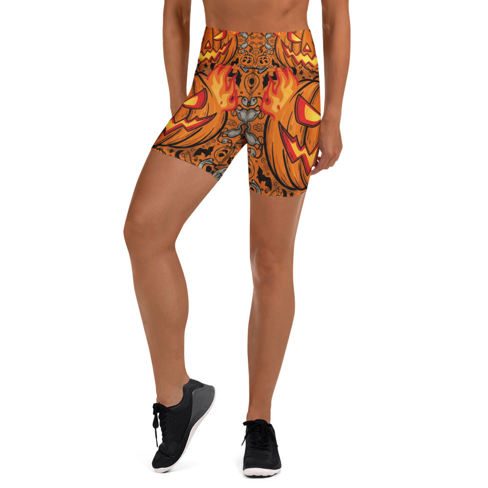 Women's carved jack-o'-lantern glow yoga shorts front view