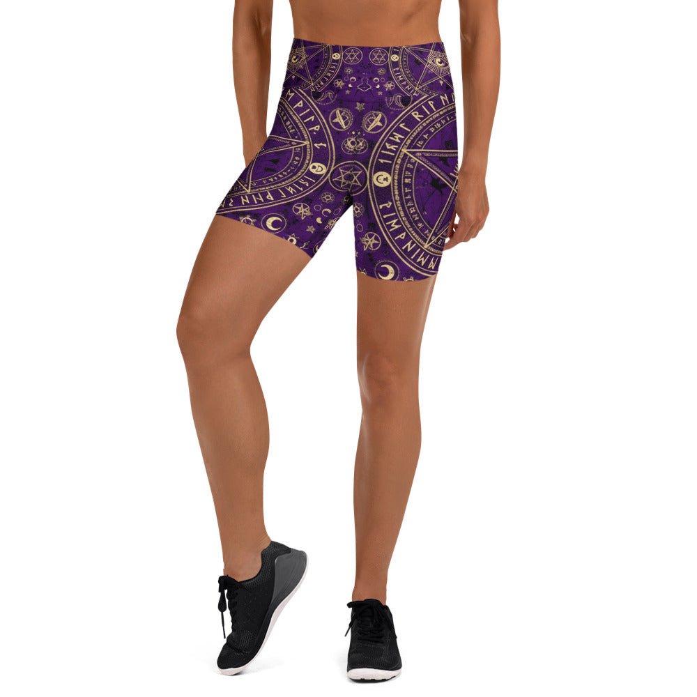 Geometric pentagram design in black, gold, and purple on premium GearBunch Yoga Shorts.