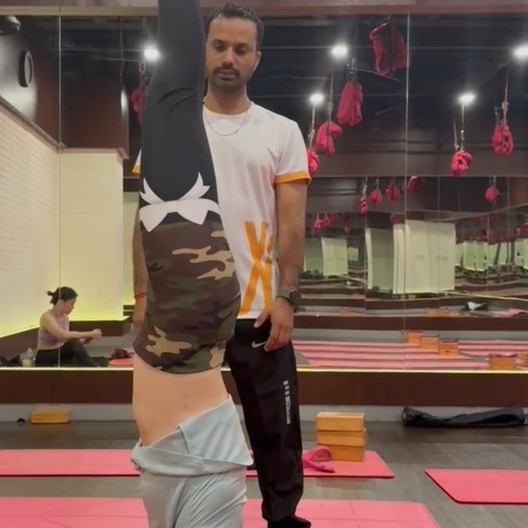 Woman wearing printed leggings, showcasing activewear beyond basic retail styles