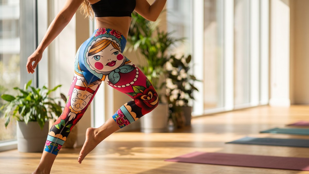 Lifestyle image of a model wearing Russian Matryoshka Doll Capris from GearBunch
