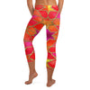 Close-up of fiery red, orange, and gold Arabic Fire Opal print on GearBunch Capri Leggings. Geometric pattern with vibrant colours.