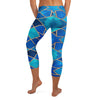 Geometric sapphire blue, teal, and bronze patterned GearBunch Capri Leggings for women's activewear.