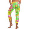 Vibrant geometric print on GearBunch Capri Leggings in shades of green, pink, orange, and yellow, perfect for workouts or casual wear.