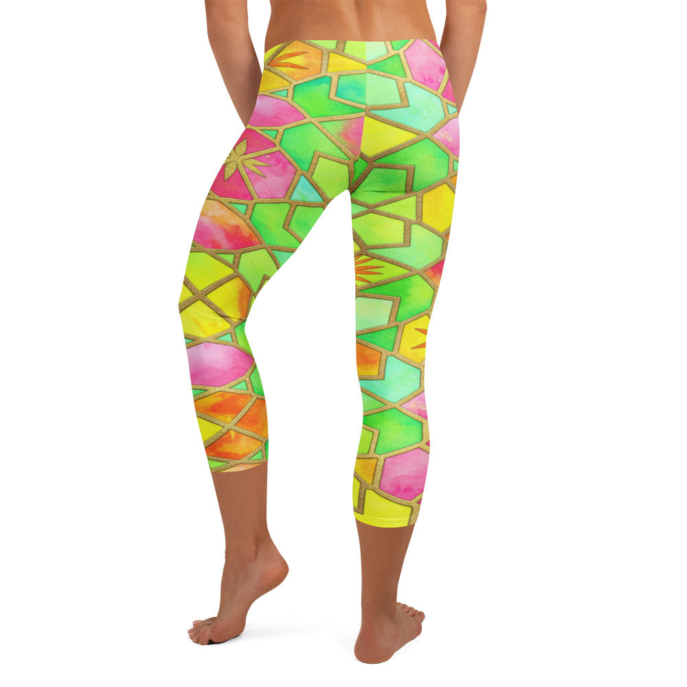 Vibrant geometric print on GearBunch Capri Leggings in shades of green, pink, orange, and yellow, perfect for workouts or casual wear.