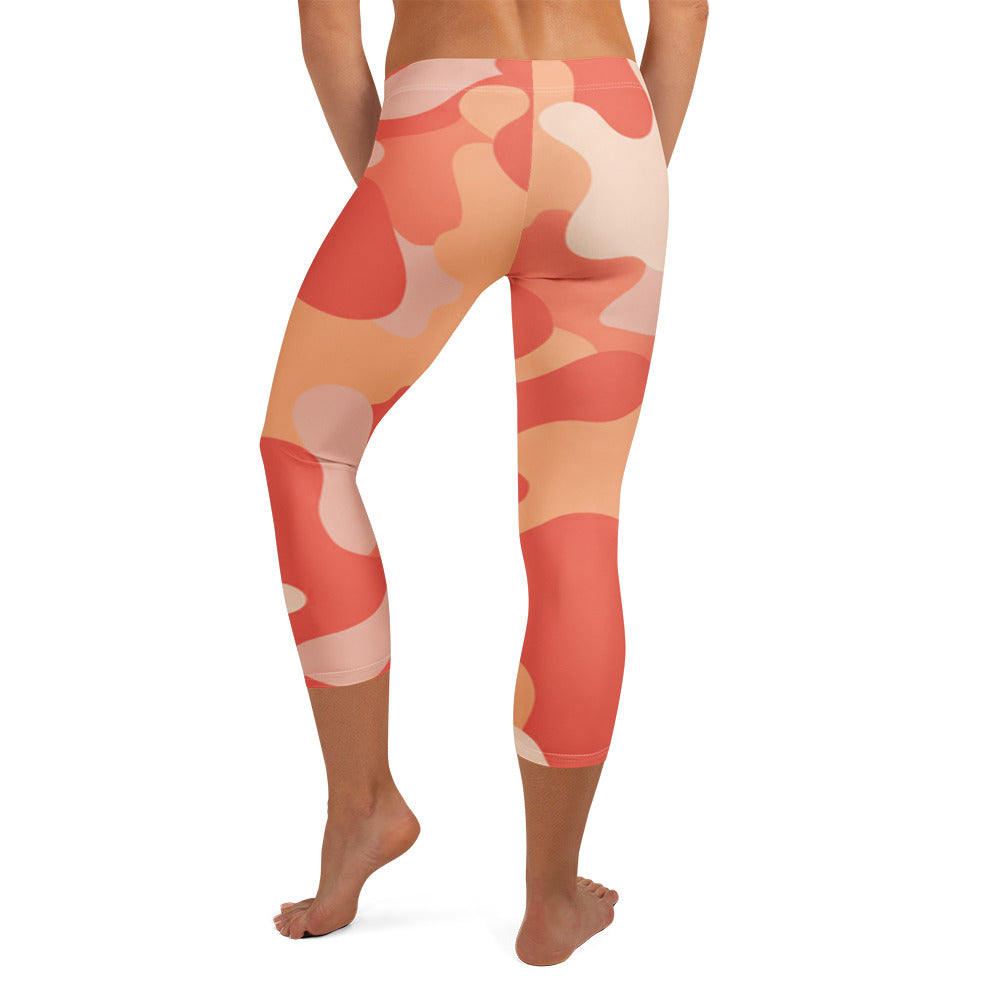 Coral Sunset Camo Capri Leggings from GearBunch, featuring a unique coral and pink camouflage pattern