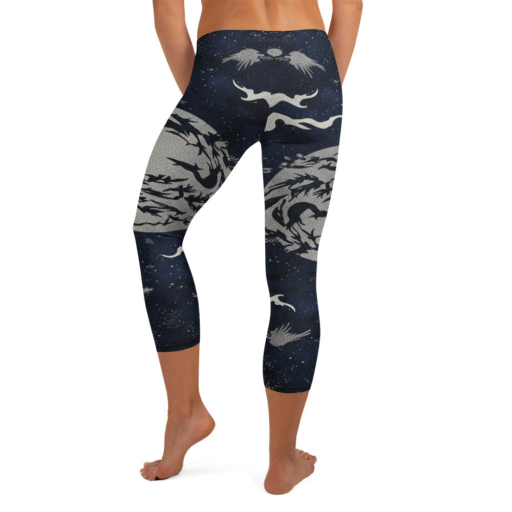 Dramatic crow design on GearBunch Capri Leggings, charcoal, silver, and blue-black colours, Moonlit Crow Capri Leggings