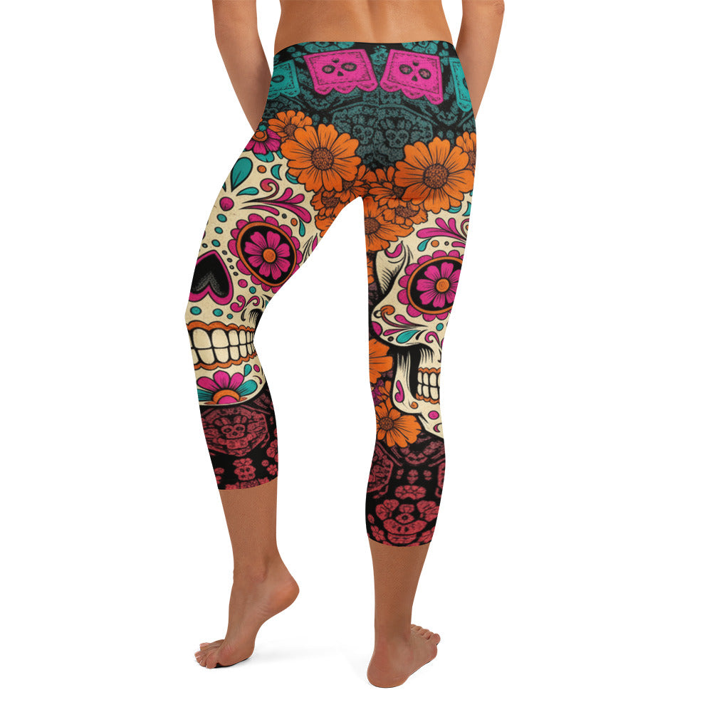 Vibrant Día de los Muertos floral and sugar skull design on GearBunch Capri Leggings