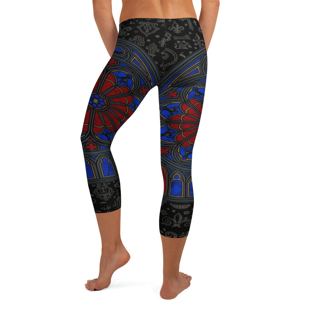 Gothic cathedral-inspired stained glass design on premium GearBunch Capri Leggings with vibrant emerald green, red, and blue.