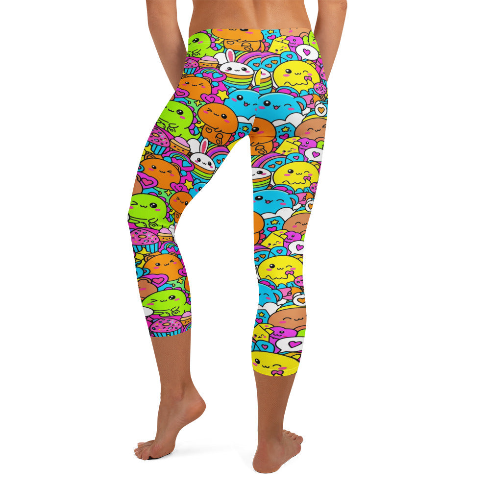 Kawaii Dinosaur Stomp Capri Leggings by GearBunch. Bright, colourful dinosaur print capri leggings for workouts and casual wear.