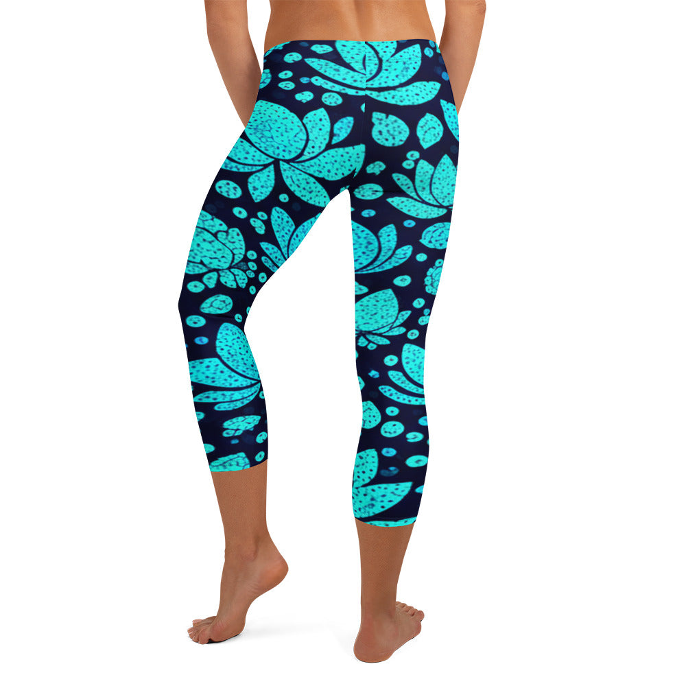 Women's teal lotus capri leggings front view