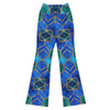 Full body shot of a woman wearing Arabic Sapphire Bronze GearBunch Flare Leggings with geometric patterns.
