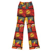 Woman in Comic Strip Boom Town Flare Leggings from GearBunch, featuring an explosive comic book design with red, orange, and yellow hues.