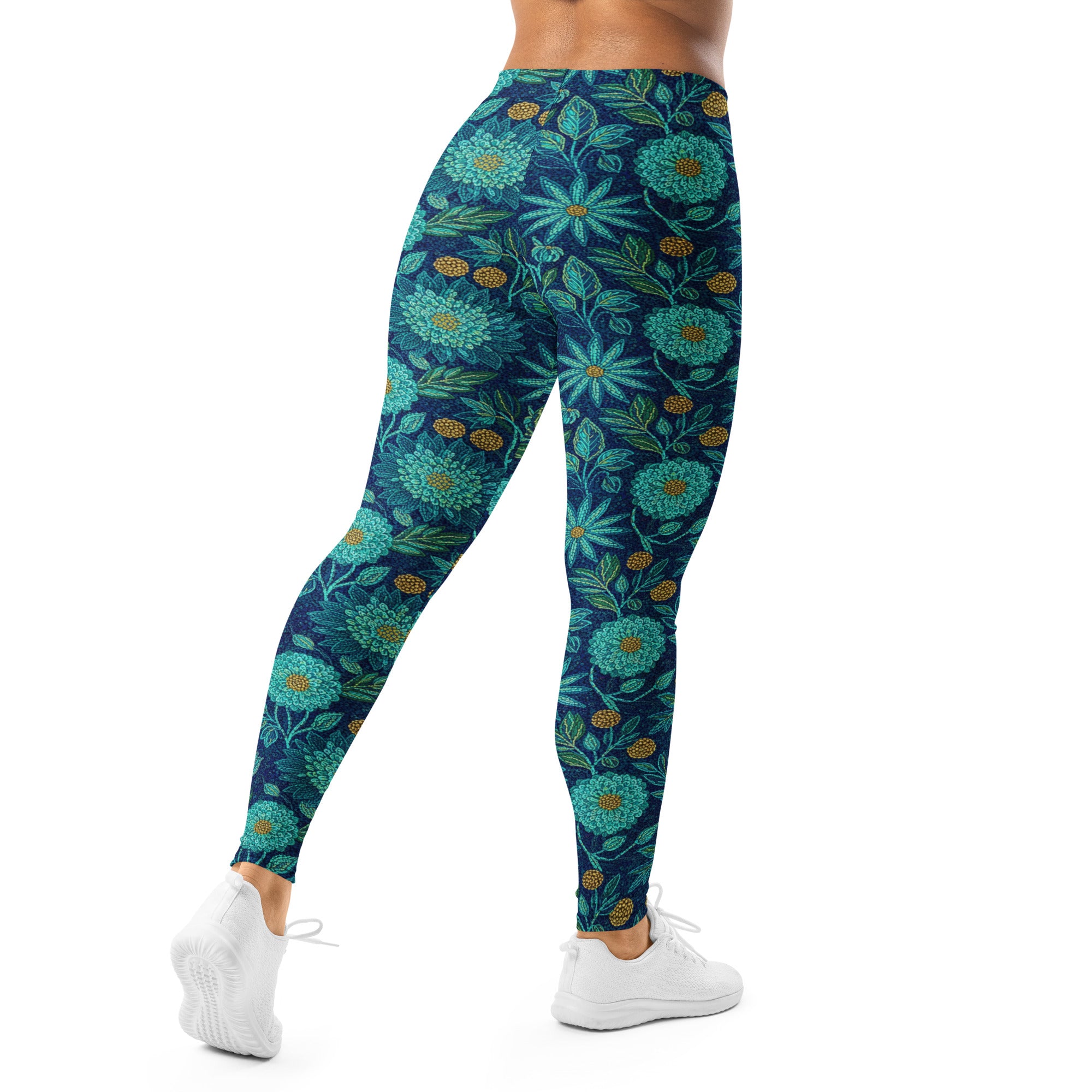 Close-up of the Teal Paillette Lotus Garden Leggings showcasing vibrant teal and gold floral designs on a dark blue background, GearBunch Leggings