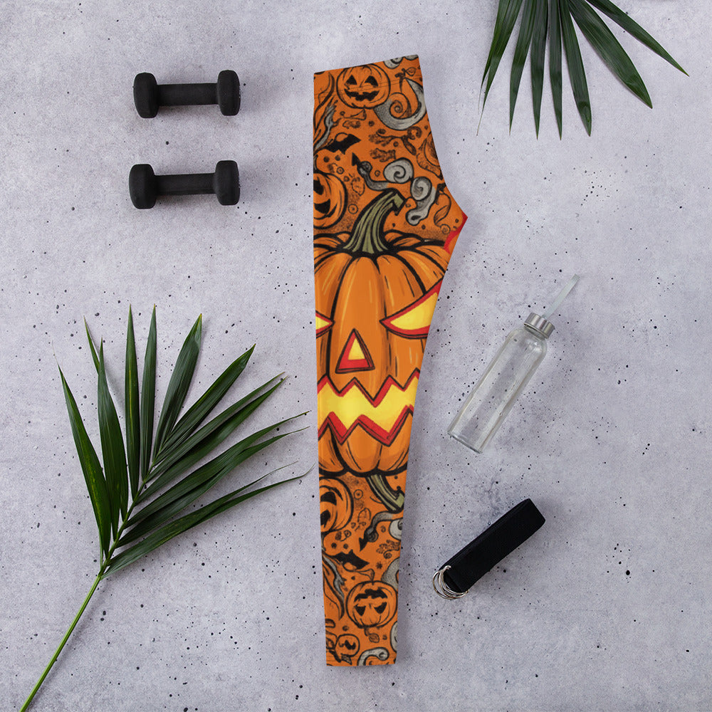 Bold Carved Jack-o-Lantern Glow Leggings from GearBunch, featuring a pumpkin and ember glow design on black.