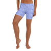Active woman in Kay Nielsen Fairytale Gear Up Shorts, showcasing sky blue, lavender, and white pattern. GearBunch Shorts.