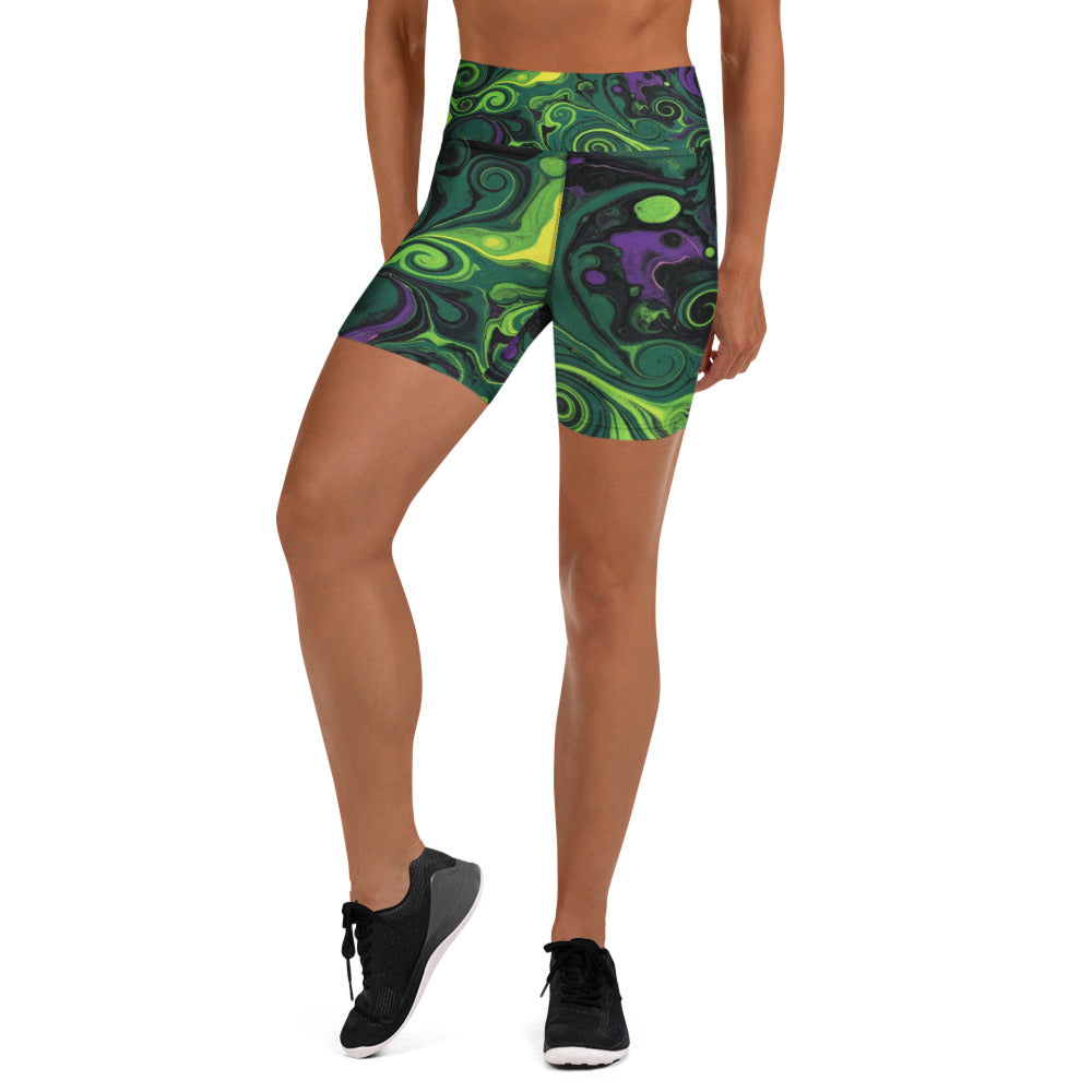 Close-up of vibrant, swirling acid green, purple, and black liquid marble pattern on GearBunch Yoga Shorts.