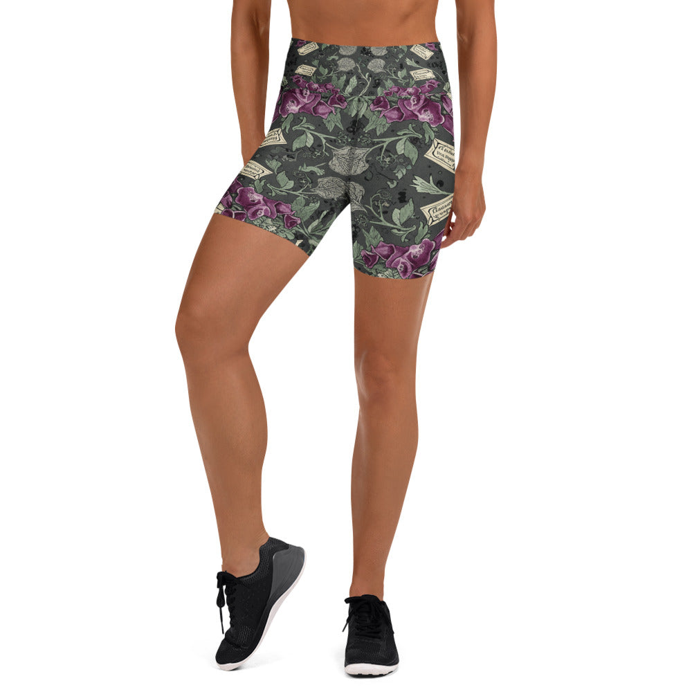 Detailed Hemlock and Foxglove floral print on GearBunch Yoga Shorts, a dark and stylish activewear choice.